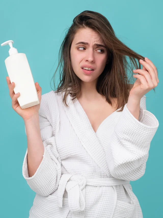 sad-girl-looking-her-damaged-hair-woman-hold-bottle-shampoo-conditioner-woman-touching-her-hair-hair-loss-dry-scalp-problem